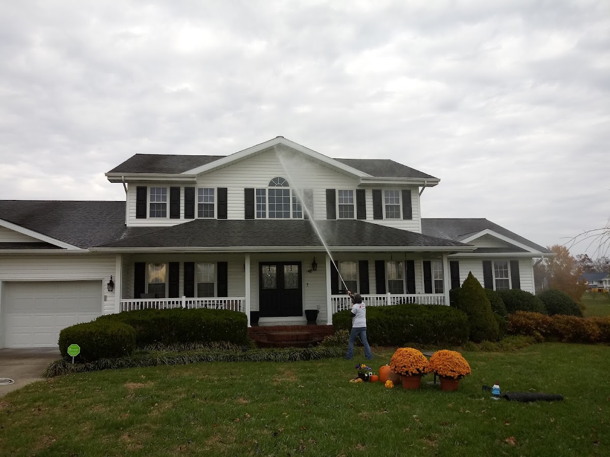 McGinnis crew washing a white two storey home
