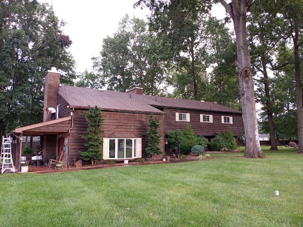 Log sided home and lawn on a McGinnis job
